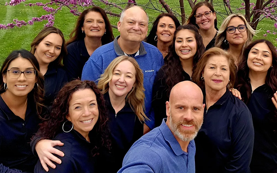 Dr. Williams with the Siouxland Orthodontics team outdoors